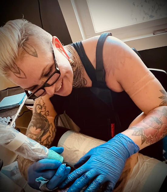 photo of Bonnie Gillson tattooing
